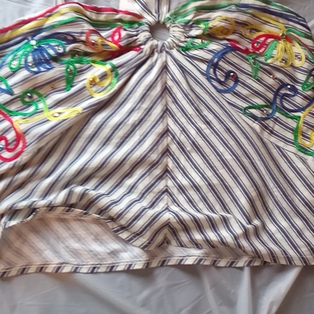 Summery polyester shirt with a little silk for women or girls.